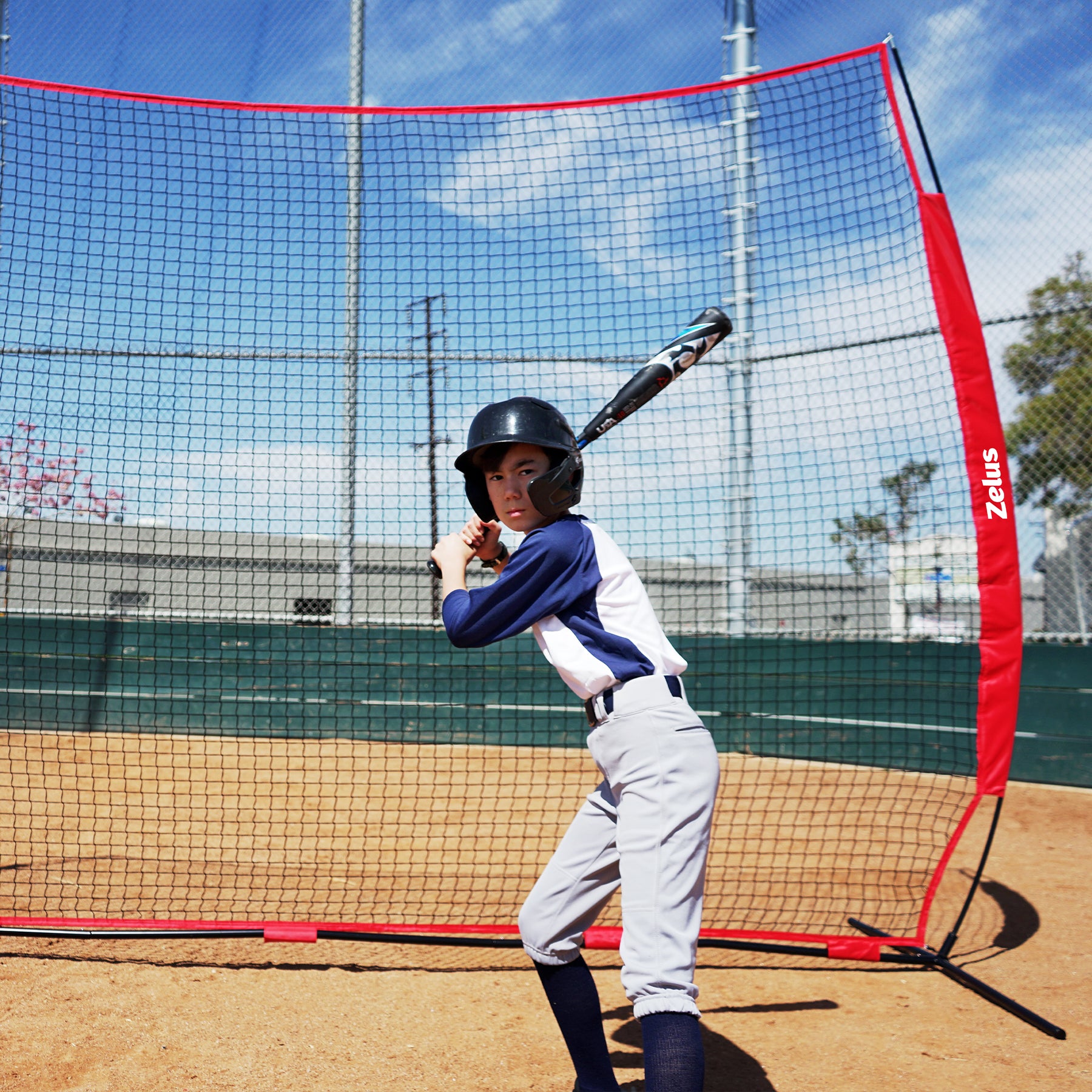 Red and black sports training net with Zelus branding