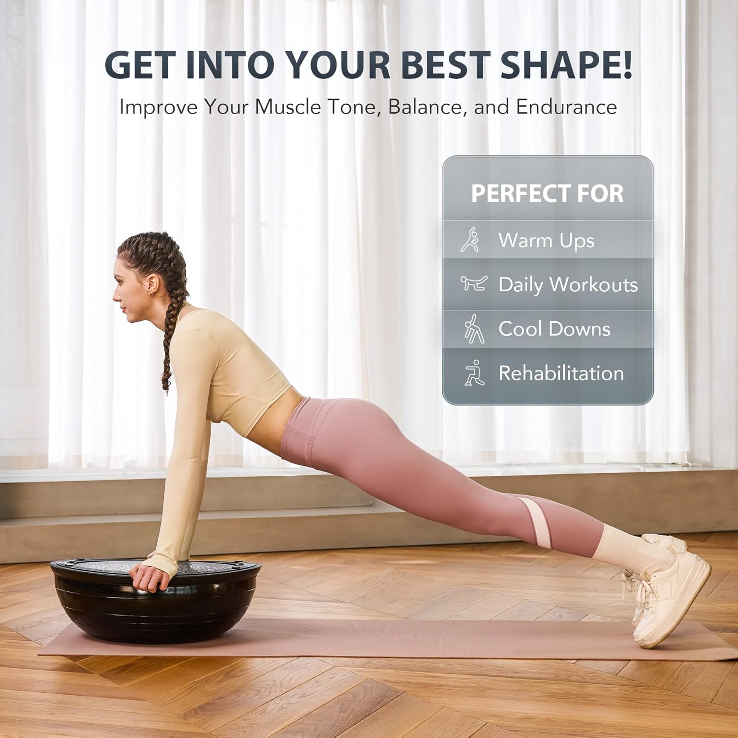 Person using a black exercise ball for workouts in a home setting.