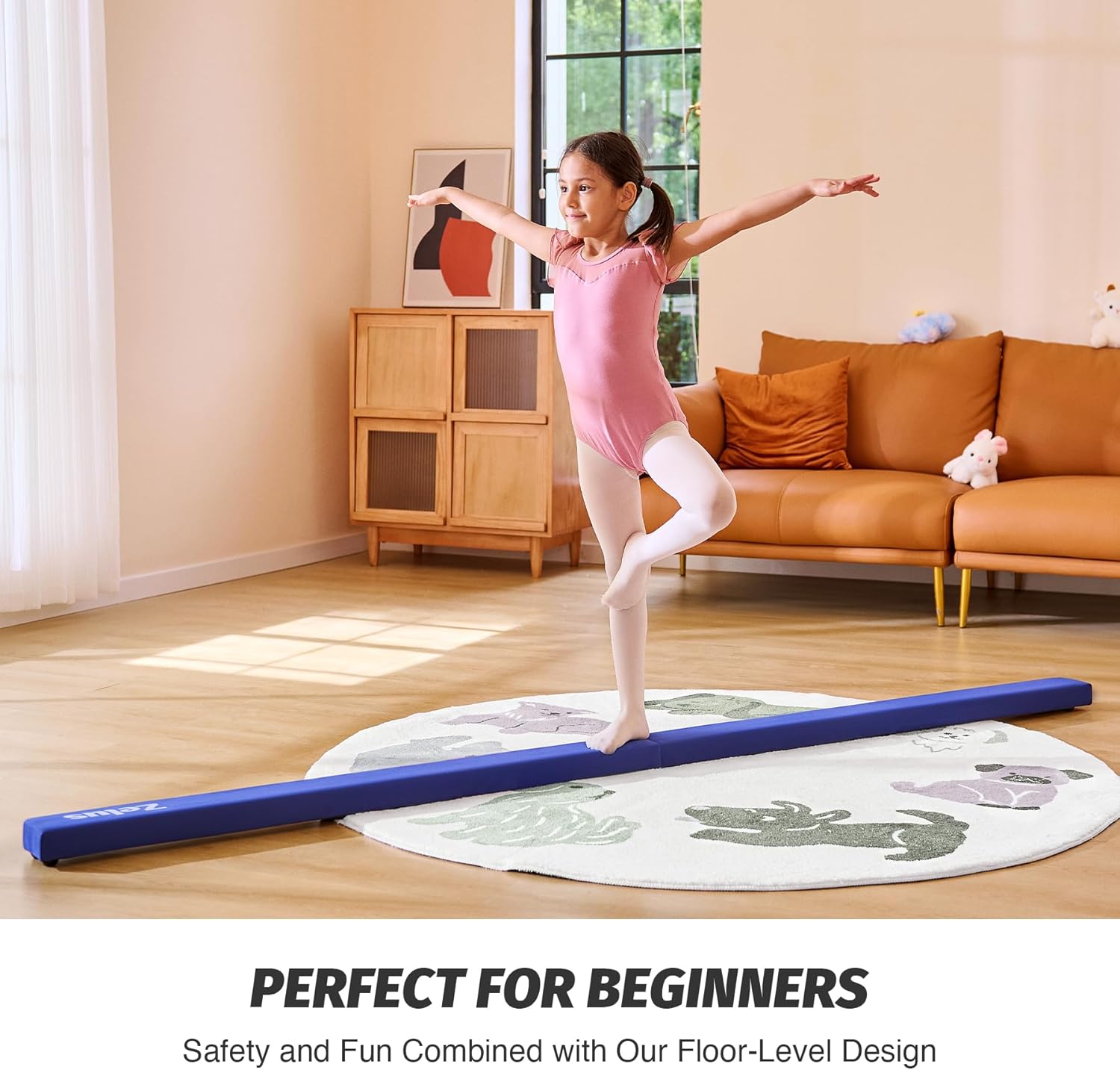 Young girl in a pink outfit practicing on a blue balance beam in a living room.