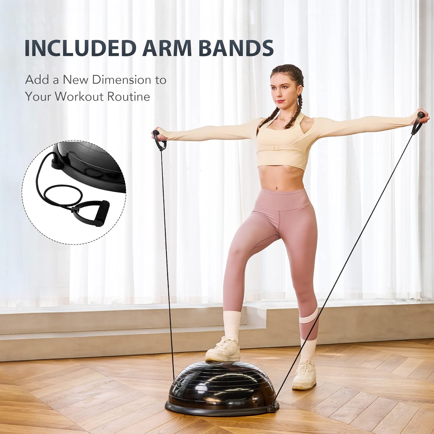 Woman using a balance trainer with arm bands in a home setting