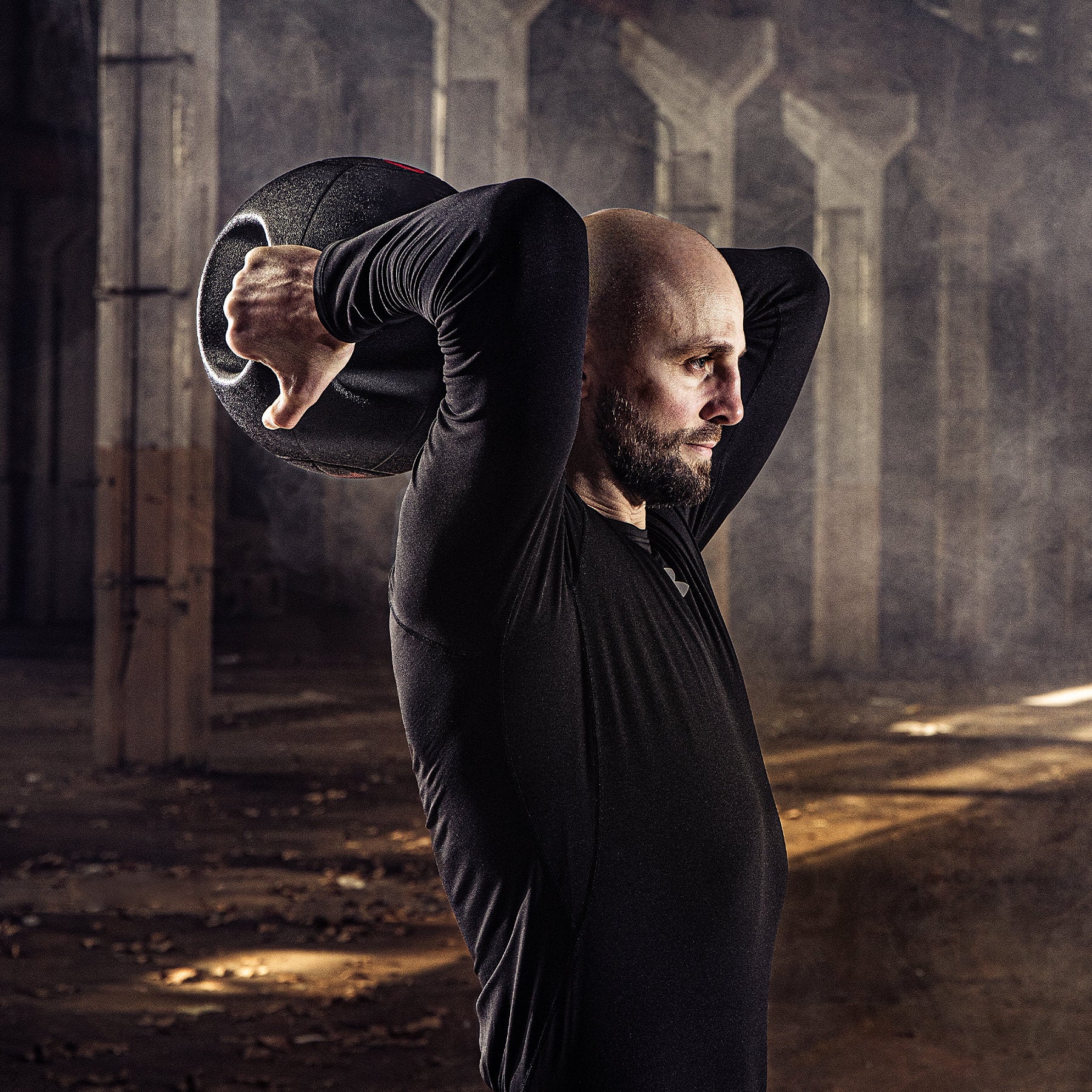 Black ZELUS double-handle medicine ball with red branding