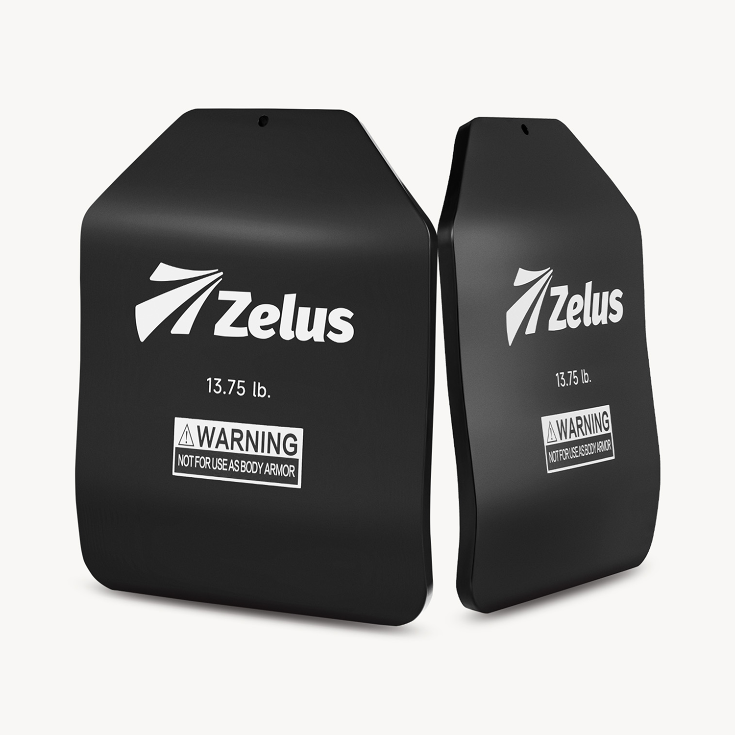 Two black Zelus performance plates on a white background